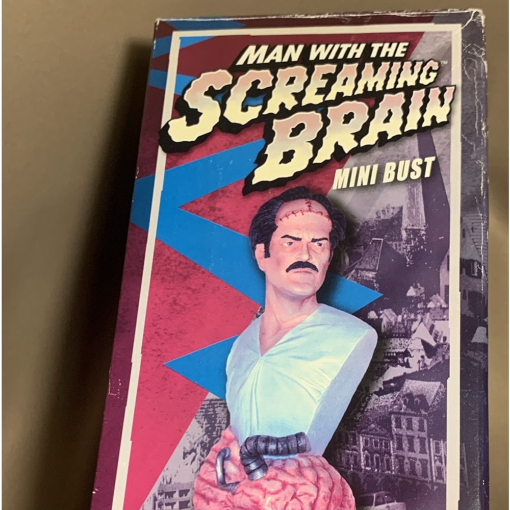 Man With The Screaming Brain Bust - image 1